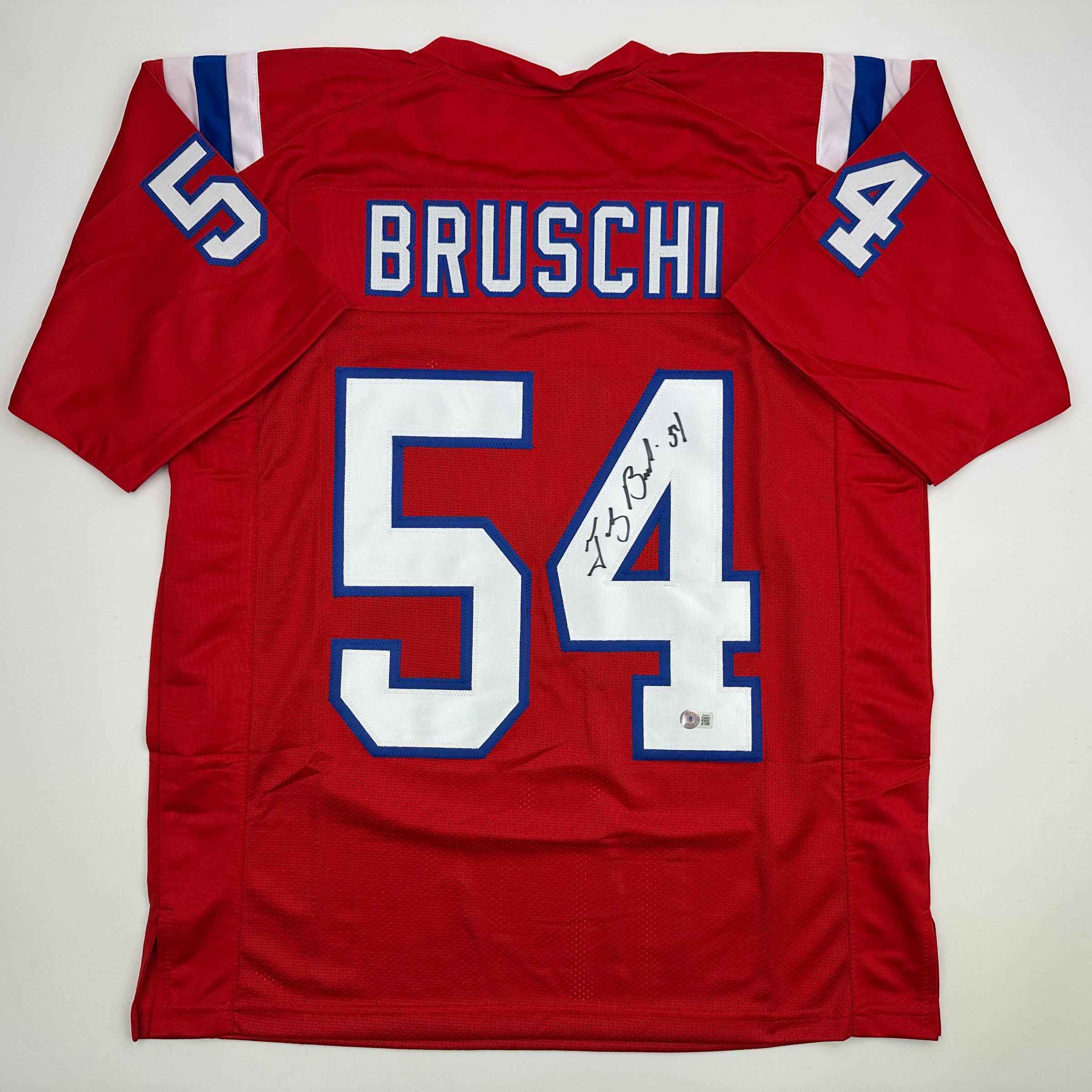 Autographed/Signed Tedy Bruschi New England Red Football Jersey Beckett BAS COA